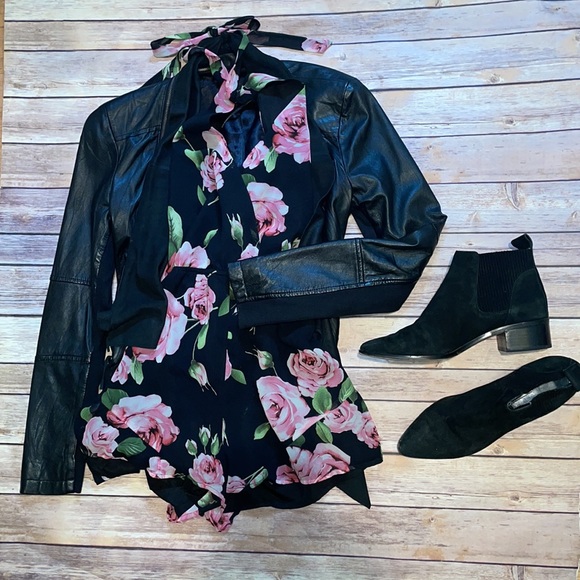 Black Floral Rose Halter Backless Romper with Ruffle Hem - Picture 7 of 7